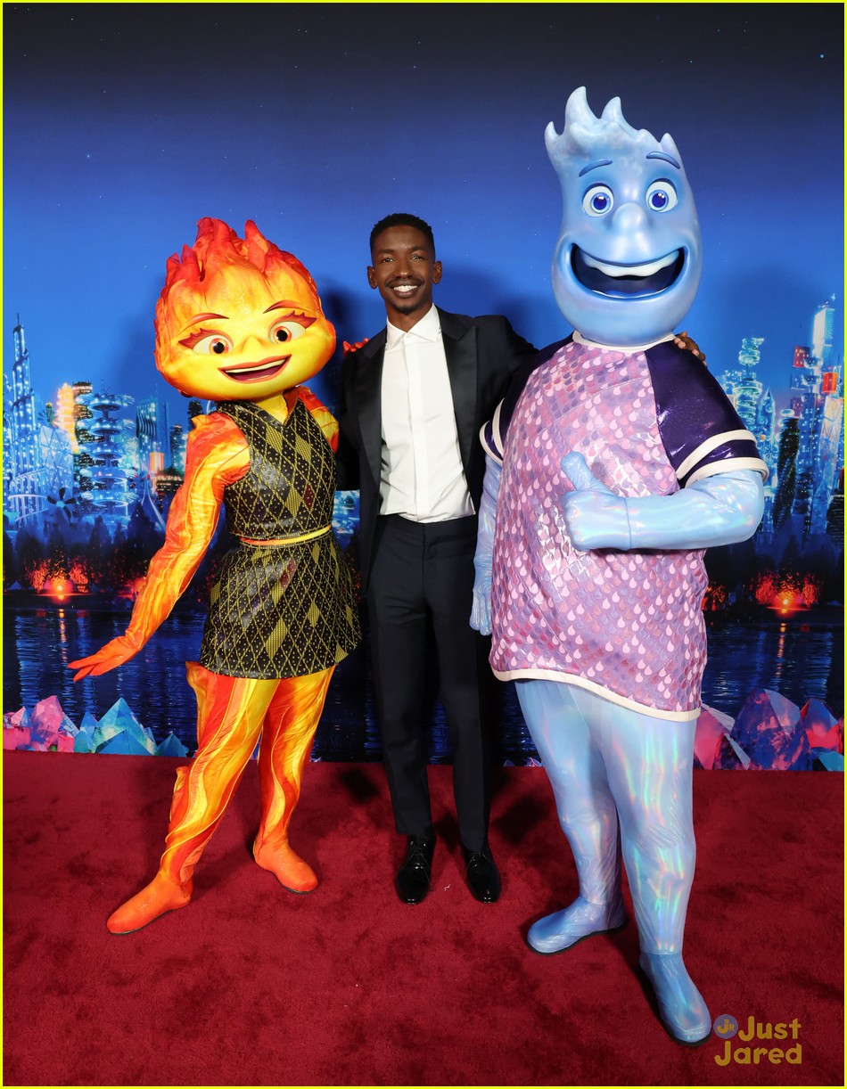 Leah Lewis & Mamoudou Athie Pose With Their Characters at 'Elemental' LA Premiere