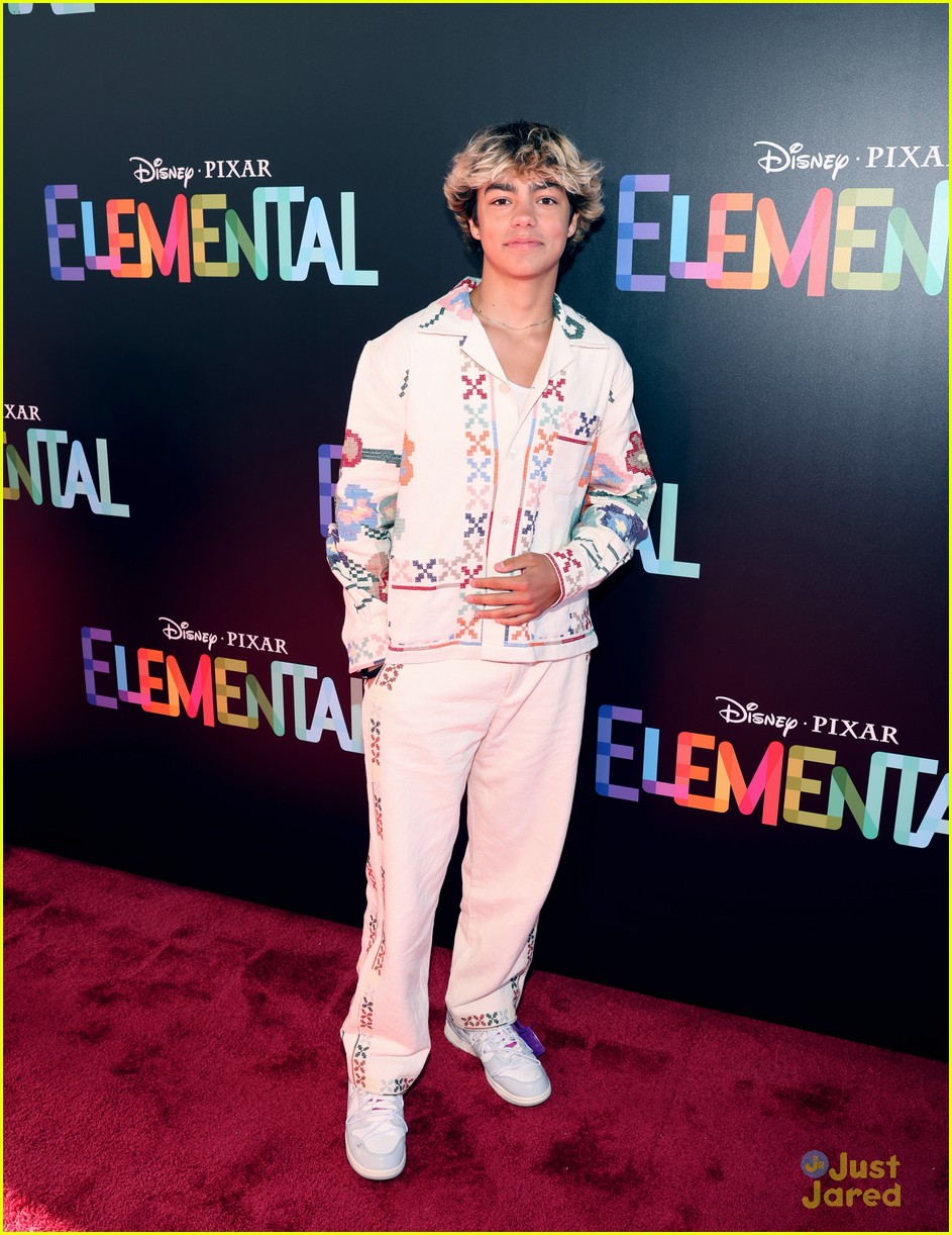 Leah Lewis & Mamoudou Athie Pose With Their Characters at 'Elemental' LA Premiere